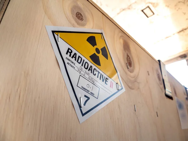 Radioactive material label beside the transportation wooden box Type A standard package