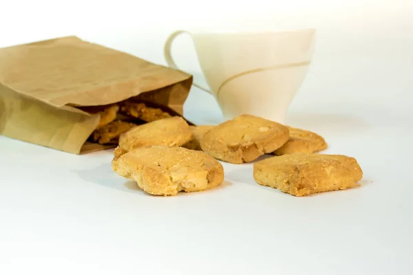 Biscoitos Saco Papel Uma Xícara Café — Fotografia de Stock
