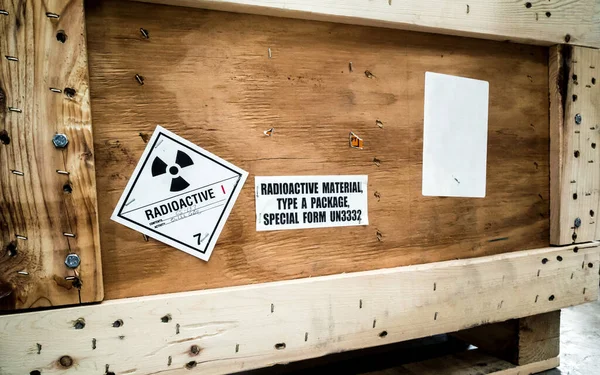 Radioactive material label class White I beside the transportation wooden box Type A standard package