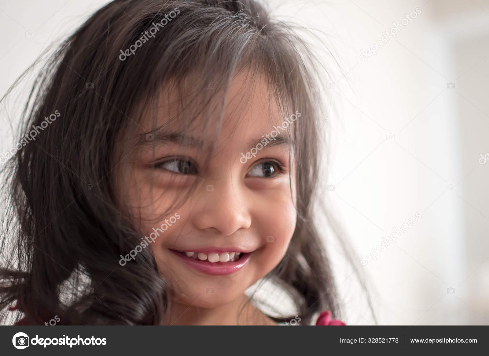 Stylist curling hair for little girl in a parlor Stock Photo by ©bill ...