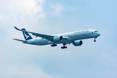 Changi Uluslararası Havalimanı, Singapur 'a 30 Mart 2020' de inen CATHAY PACIFIC Hava Yolları uçağı