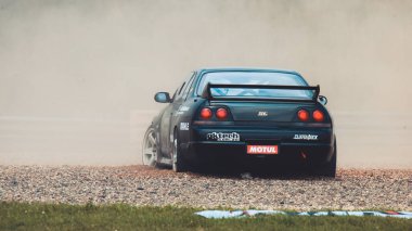 Oschersleben, Almanya, 30 Ağustos 2019: Rick van Goethem Almanya 'daki Motorsport Arena' da oynanan Drift Kings Uluslararası Serisi sırasında Nissan Skyline R33 'ü sürüyor.
