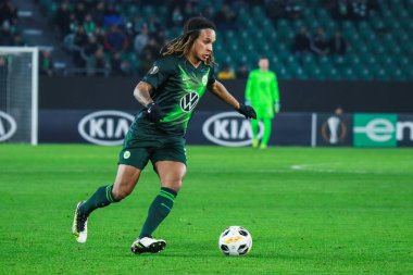 Wolfsburg, Almanya, 12 Aralık 2019: Uefa Avrupa Ligi maçında Vfl Wolfsburg ve As Saint-Etienne arasında Wolkswagen Arena, Almanya 'da oynanan maçta futbolcu Kevin Mbabu görev aldı..