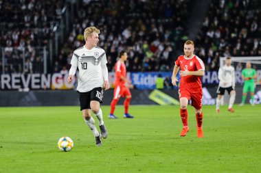 Wolfsburg, Almanya, 20 Mart 2019: Julian Brandt Wolfsburg 'daki Volkswagen Arena' da Almanya ile Sırbistan arasındaki uluslararası dostluk maçı sırasında.