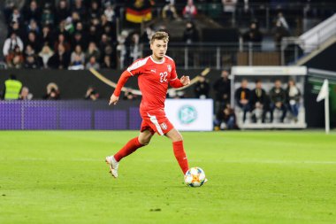 Wolfsburg, Almanya, 20 Mart 2019: Sırp futbolcu Adem Ljajiç, Almanya 'nın Sırbistan' a karşı oynadığı uluslararası dost futbol maçı sırasında görev başında.