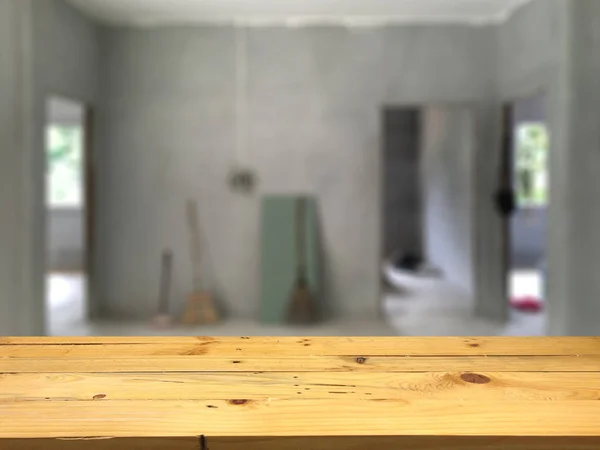 Empty wooden table space platform and blurred Home construction — Stock Photo, Image