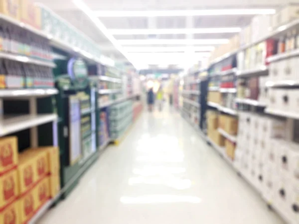 Abstracto desenfoque supermercado y tienda al por menor en el centro comercial inte —  Fotos de Stock