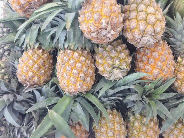 Many pineapples textured for background — Stock Photo, Image