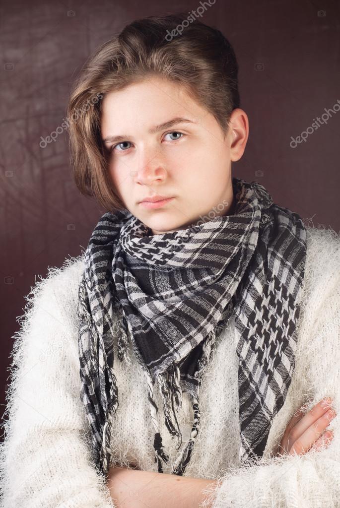 Teen Girl With Short Hair Is In A White Jacket Stock