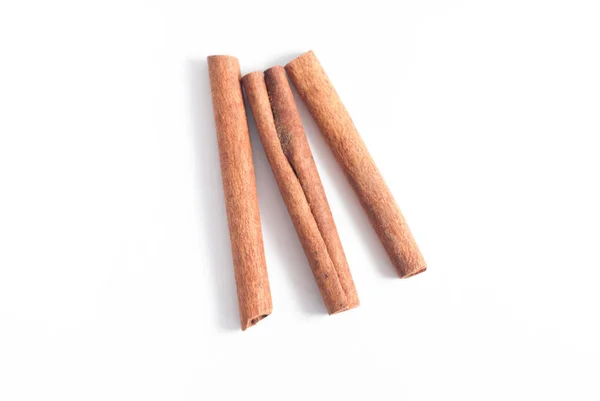 Cinnamon sticks on white background. — Stock Photo, Image