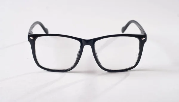 Fekete szemüveg fehér háttérrel, — Stock Fotó