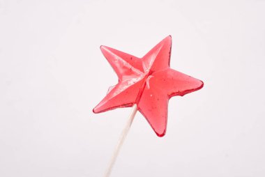 Lolipop beyaz arka plan üzerinde bir yıldız şekli,
