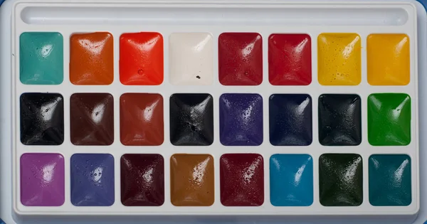 Palette of watercolor paints close up, the paint for drawing — Stock Photo, Image