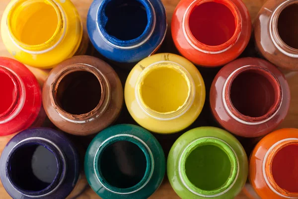 Frascos de colores con pintura acrílica. vista superior , —  Fotos de Stock