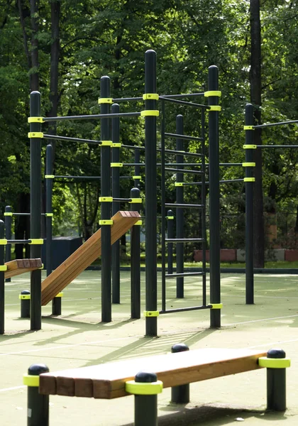 Street sports ground. The horizontal bar and benches