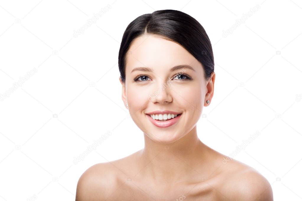 Isolated on white background portrait of young attractive woman. Smile and perfect skin