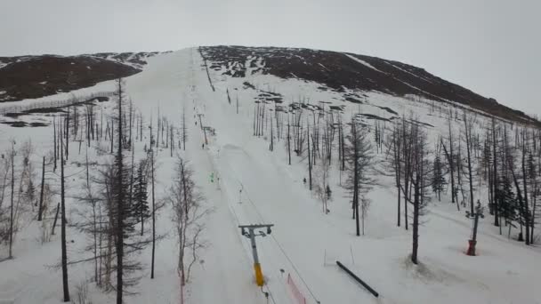 Aerial View of Skiing People and Ski Lift. Russia, Norilsk — Stock Video