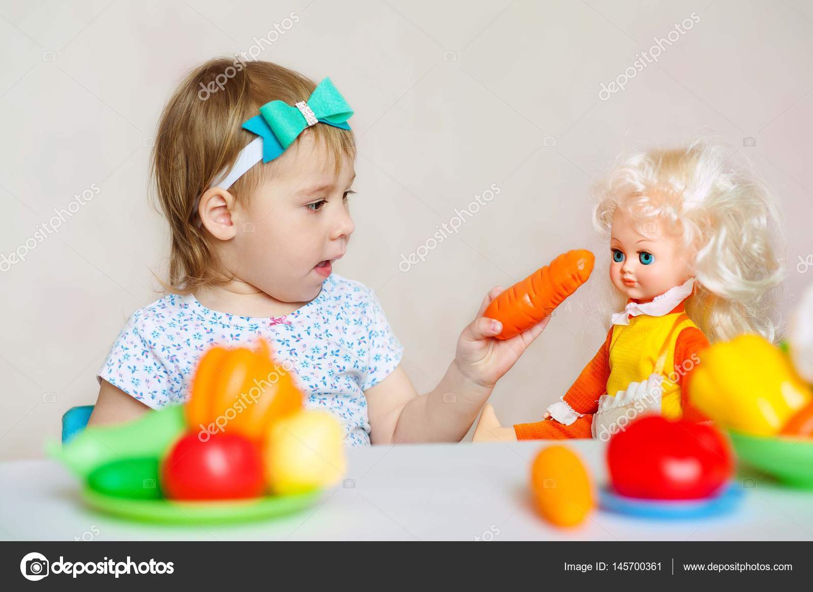 feeding doll baby