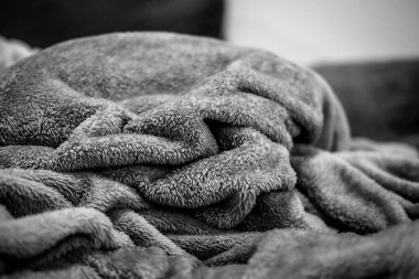 Yakın çekim yumuşak kumaş örtüsü. siyah-beyaz ton ve vignet.