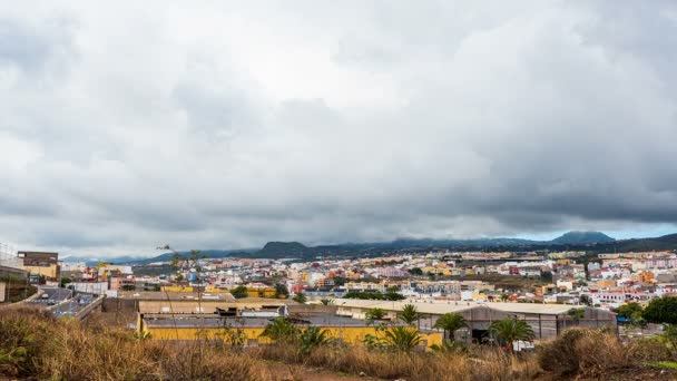 Houses in mountain city. Rainy clouds. Timelapse. — Stock Video