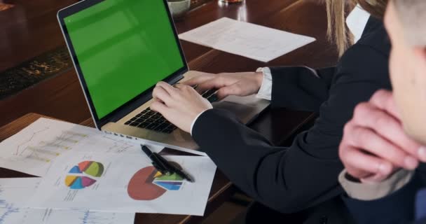 Thoughtful man see how woman working in the brightly lit modern office. Concerned female work with laptop. Business people creating new startup project concept — 비디오