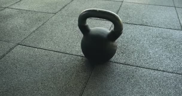 Isolated kettlebell. Gym Equipment Close Up. Slider Shot Kettlebells — Stock Video