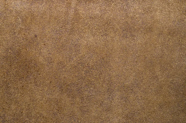 Brązowe zamszowe miękkiej skóry jako tekstura tło. Skóra z bliska — Zdjęcie stockowe