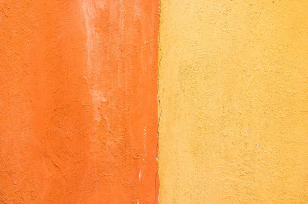 Close-up amarelo e laranja fundo parede de concreto cor. textu — Fotografia de Stock