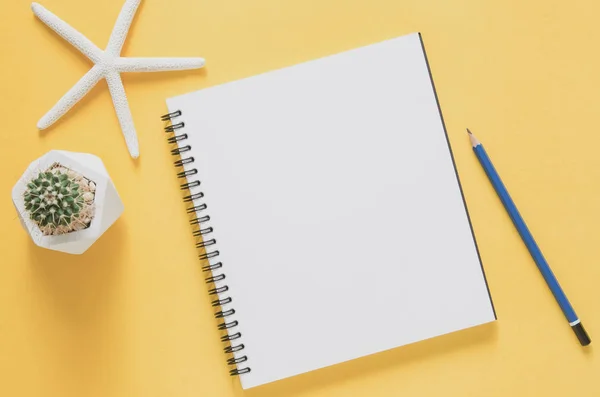 Office workplace minimal concept. Blank notebook with starfishes — Stock Photo, Image