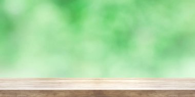 Boş ahşap masa üstü bulanık yeşil doğal soyut backg ile