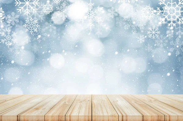 Christmas and New year background. Wooden table with winter snow