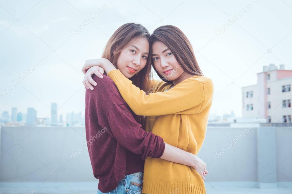 Lovely lesbian couple together concept. Couple of young women hu