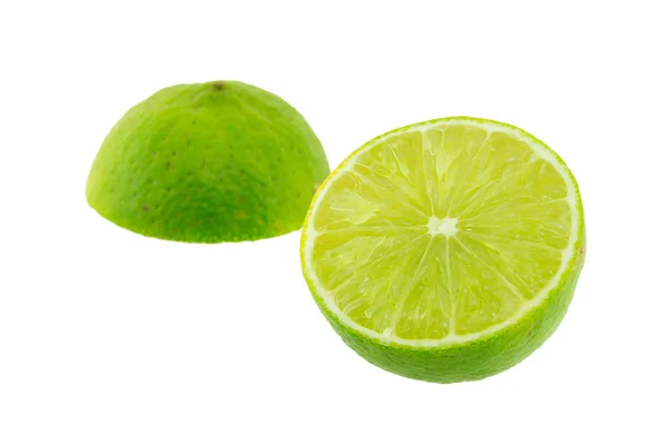 Limes met helft geïsoleerd op witte achtergrond — Stockfoto