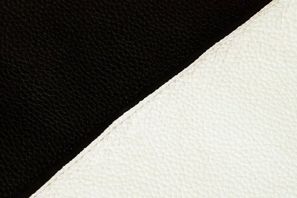 Textura de cuero genuino blanco y negro de cerca cosido con puntada. Para fondo, telón de fondo, sustrato, uso de composición. Combinación de colores clásica siempre de moda . —  Fotos de Stock