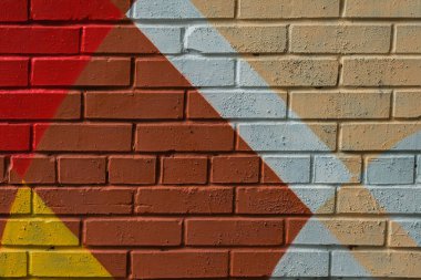 Graffity tuğla duvar, çok küçük detay. Kentsel sokak sanat tasarım yakın çekim. Modern ikonik kent kültürü, şık desen. Arka planlar için yararlı olabilir. Aerosol resimleri