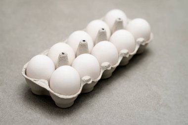 10 tavuk yumurta karton paket, çapraz. Paskalya, sağlıklı yaşam, vitaminler ve mineraller, organik gıda, diyet, protein ve kolesterol için kavram