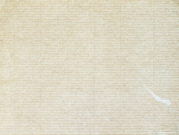 Textura de papelão ondulado bege, papel para obras de arte. Fundo moderno, pano de fundo, uso com espaço de cópia — Fotografia de Stock