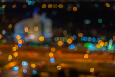 Soyut kentsel gece, Bina ya da hafif bokeh, gece stadyumda odak, arka plan kullanım için twilight saat bulanık.