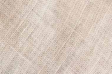 Çul veya doğal organik çuval bezi arka plan görünür doku kopya alanı metin ve diğer web baskı tasarım öğeleri için ile.