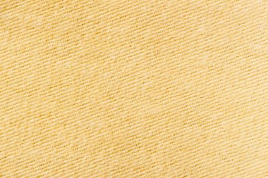 Kumaş dokusu, köşegen desen, bej rengi. Arka plan için zemin, substrat, kompozisyon kullanın. Metniniz için yer