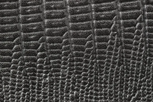Originální kožená textura pozadí zblízka, vyražený pod kůží plazí, šedá černá barva tisku. Pojem nakupování, výroba — Stock fotografie