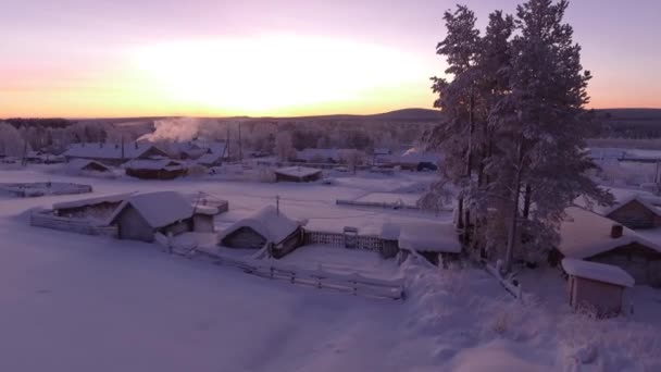 Small Village Country Wooden Houses Cowered With Deep Snow Early Morning Sunrise Cold Frozen Weather Pine Christmas Trees - 