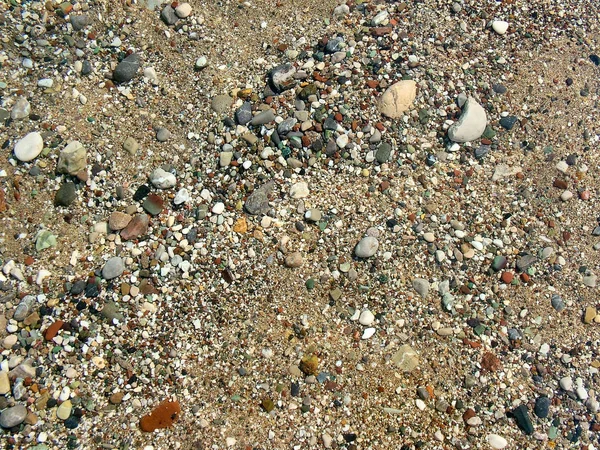 Pebbles on the beach in sea — Stock Photo, Image