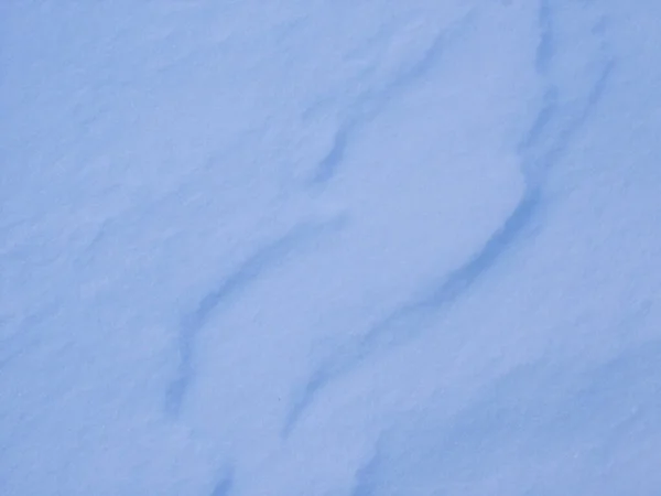 积雪表面的阴影和不规则现象 — 图库照片