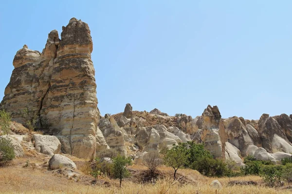 Natural valley with volcanic tuff stone rocks in Goreme in Cappadocia, Turkey. — Stock Photo, Image