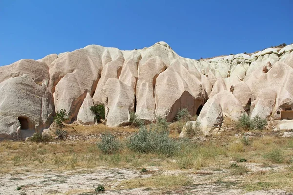 Natural valley with volcanic tuff stone rocks in Goreme in Cappadocia, Turkey. — Stock Photo, Image