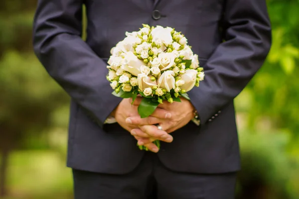 Tender beautiful bridal bouquet in the hands — Stock Photo, Image