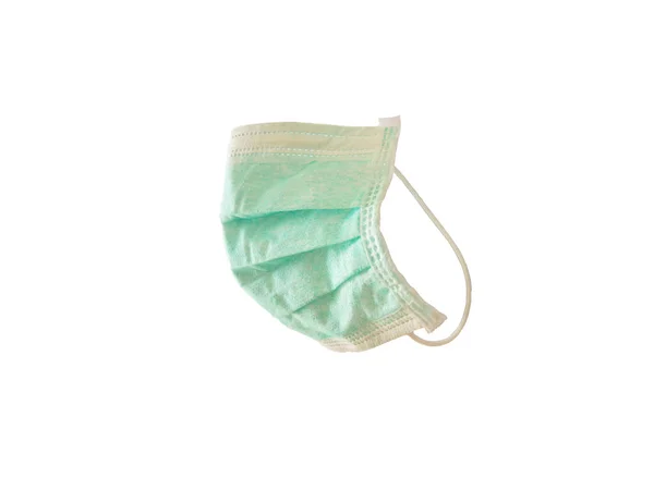 Green Doctor mask.corona virus protection on white background.medical mask isolated.Health care and pollution concept.Surgical face mask cover the mouth and nose filter with earloop.clipping path