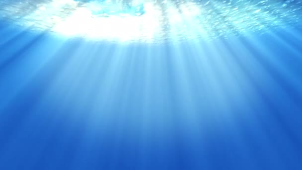 太陽の光の海水中光の美しいベール 海の波が水中を動き 虹の流れ深い澄んだ青い水から輝き 美しい水面の光を反射します — ストック動画