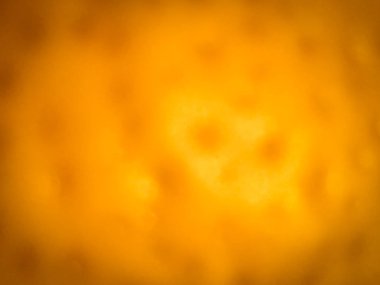 Bulanık, kirli, soyut sarı ve altın arkaplan. Bulanık yüzey